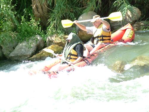 Kayak - Here I am on a bright sunny day, Kayaking with a close friend - who was afraid of the sun - on the Jordan river in the Galilee in northern Israel.