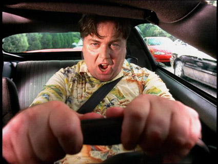 Road Rage - This is an image of a man with road rage.