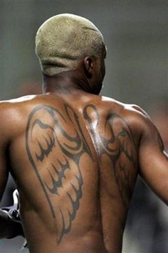 one of my favourite tattoos - a winged tattoo on the back