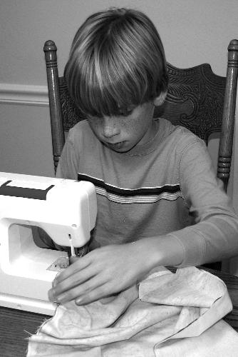 Griffen Sewing - My 8 year old son got a sewing machine for Christmas.