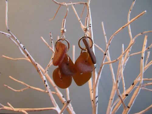 Brown Sea Glass earring - 6 flat brown pieces of sea glass adorn these wonderful earrings (3 ea) The earwire is sterling silver. These will garner many compliments!!