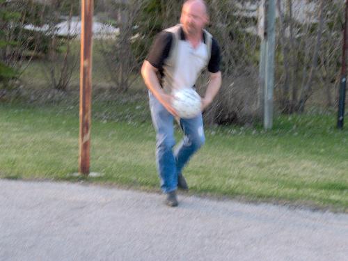 Me playing ball with 2 of my children - Walking to the park with my kids to play ball.
