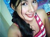 yeah.. under heavy make- up - this was me when i was working for a chat site. it was hard work really. im wearing a pink and white tank top and lots of make up. i quit ther job because its hard to stare at the screen all dfay and chat with japanese people who dont know your language.