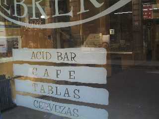Do they really sell 'acid' to their customers? - This is a café in downtown Buenos Aires. I thought it strange that they would put 'acid bar' etched in the glass. The word 'acido' in Spanish means 'citrus', so I'm sure people from here just translate the obvious English word incorrectly and there is no problem for them. English speakers on the other hand, will just laugh.