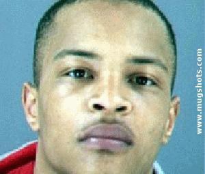 Hip Hop, Violence & Guns - This is an image of rapper T.I's mugshot due to his conviction for illegal firearms and gun charges.