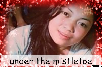 under the mistletoe - just simple....have a little smile.