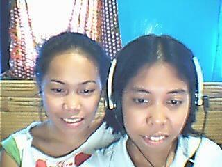 My and my younger Sister - My sister Lorraine and me who uses the headphone