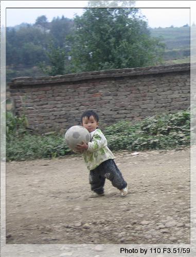 pretty babe - we must supply enough toies to child,sometimes a football is her whole world.