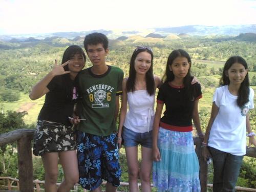 me and my cousin - we are in the chocolate hills...the guy is me