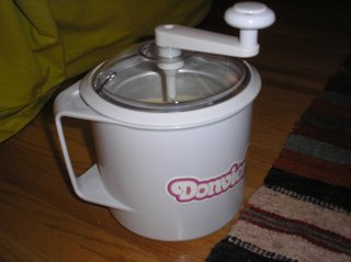 Ice cream maker - Since i don't have a digital camera, im uploading a picture on an icecream maker that looks almost identical to the one i own. Both are the same brand and the same size, the only difference is the sticker of the manufacturer and a few colours on certain details vary.