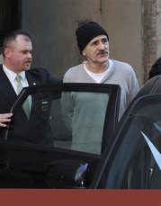 stupid - A police detective leads David Dalaia, 65, from the Midtown North police precinct, Wednesday, Jan....