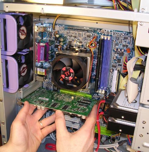 Computer Upgrading - This is an image of a tech upgrading his computer. Computer Upgrading - This is an image of a tech upgrading his computer.