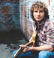 Picture of Dierks Bentley playing the guitar and d - Picture of Dierks Bentley playing the guitar and doing what he does best