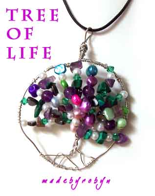 Tree Of Life Wirework Pendant - I made this pendant with a bit of help from my friend - who now owns this lovely piece might I add - she chose the beads from my collection while I worked my poor lil fingers to the bone wrapping and wrapping that artistic wire about until I had the perfect 'Tree of Life' for her.   And she loved it.
