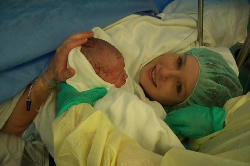 Seconds after birth - I just love this picture for some reason. I didn't get to be awake for my first child, so being awake for my second was a great experience.