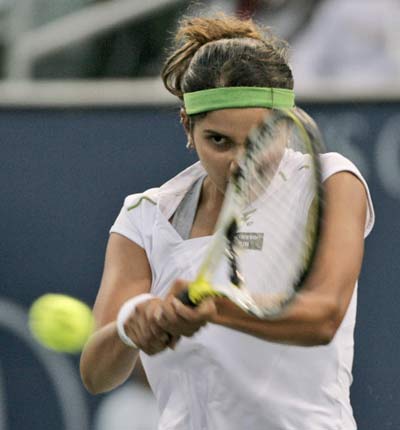 sania mirza - sania mirza plays a shot in a match