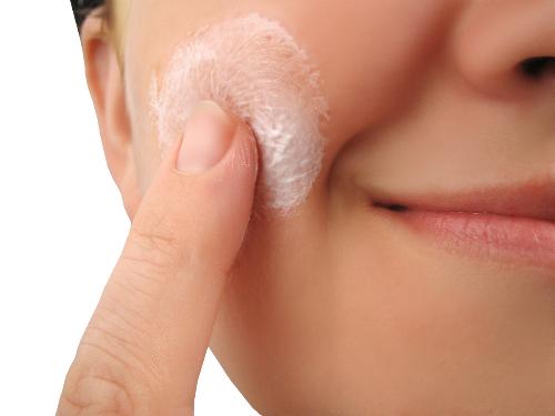 Skin Care Treatment - This is a picture of a woman useing an at home skin care treatment.