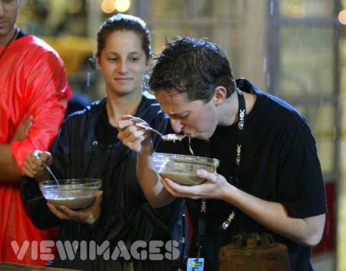A guy eating - Served fear factor style  - a guy eating - served fear factor style MMM YUMM lol
