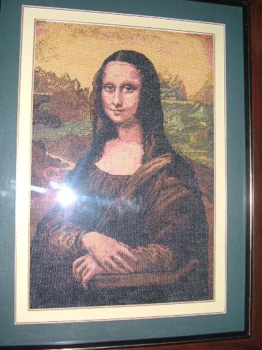 The beautiful needle work Mona Lisa made by Chuanh - I could not believe she could finish this complicated masterpiece with all kinds of colorful threads. The beautiful needle work Mona Lisa made by Chuanh - I could not believe she could finish this complicated masterpiece with all kinds of colorful threads.