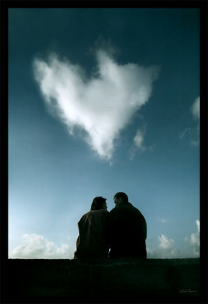 Love - Love, couple sitting with a heart shaped cloud overhead.