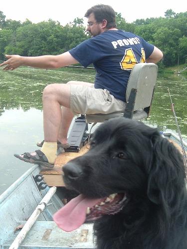 Minnie fishing with Tim - Minnie would live in the boat if we allowed her to. Minnie fishing with Tim - Minnie would live in the boat if we allowed her to.