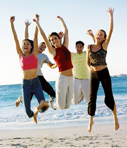 teenagers jumping - teenagers are always enjoying themselves playing games and jumping as they must be