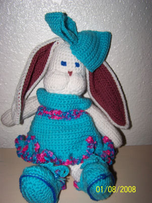 Bunny - This is one of the things I crochet. Its called a sugar bunny! She has a baby bunny that can hold hard individually wrapped hard candies!
