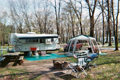 Our Camper set up at a campground - Our usual set up when we camp. The screen house is used mainly for dining.