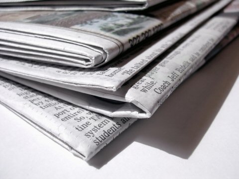 Newspapers - A bunch of folded newspapers