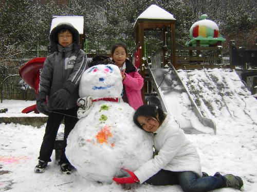 Our Snowman - We tried to make it look a little better but it's the best we can do!