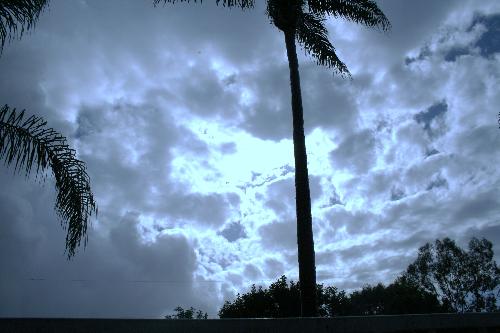 break in weather in Southern California - I was playing around and adjusting the color and tint of the photo to make the clouds look blue, thus the funny color of the photo.