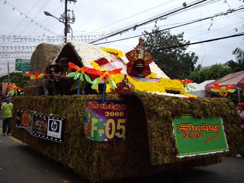Sinulog 2008 -  This is photo of a float taken during the the celebration of Sinulog 2008 at Cebu Philippines. This celebration is in honor of the Senor Santo Nino whose feast day is celebrated every 3rd Sunday of January. The festivities is colourful,fun and popular that locals and foreigners flock to Cebu to join the festivites.