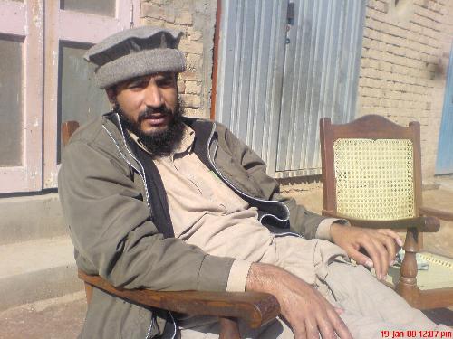 Rana Sohail - This man is not the memmer of Alqaida. He is Mr.Rana Sohail Ahmed from 74 JB Thikriwala Faisalabad. HE is my old class fellow and my good friend and village fellow. He is sitting in frony of his house.