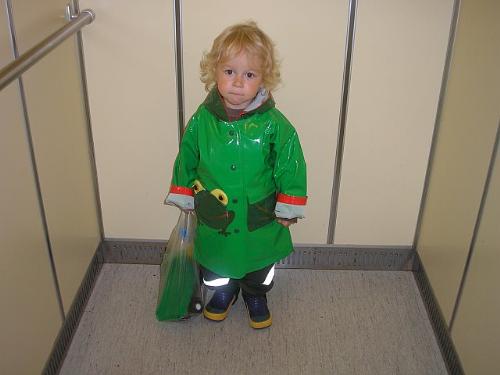 Noi - This is my grandson Noi. He is the cutest thing in the world. Here he is in his new raincoat like a little frog