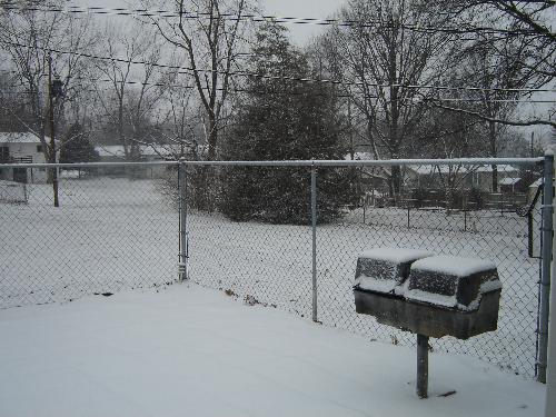 Photo of snow taken this afternoon - Photo of a small portion of our backyard