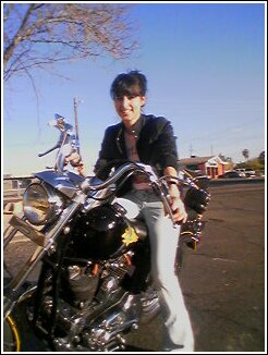 My friend Nancy sitting on my bike - Bikes always look better with a cute chick in the picture!