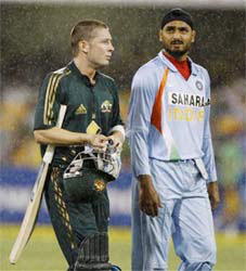 cricket - it is the picture taken in the first ODI with india and pak on 3rd february 2007...the game is not continued due to rain and the ICC gave then 2 points each.And this photograph is taken by a very good photographer.and this is the photo of harbhajan who is the spinner of india who earned 27 runs and now he is working his best with his bat with ball.and a Australia cricket also with harbhajan