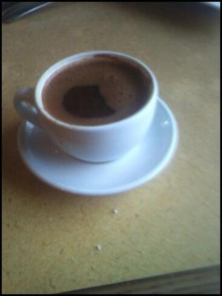 Greek Coffee - This is a Camera Phone shot of a cup of Greek Coffee I had at my favourite Greek Restaurant in Canada, the day before I flew down to Arizona. I miss that restaurant. Their coffee is absolutely wonderful. Greek coffee is very similar to Turkish coffee. Both go very well with baklava.