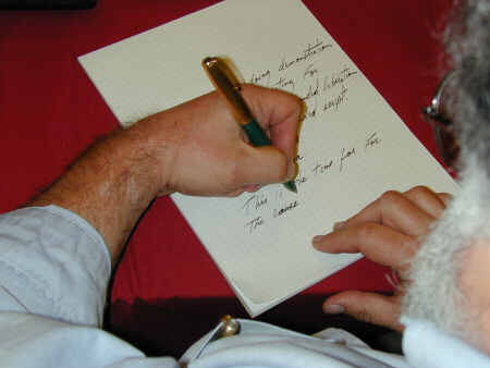 Left handed writer - Someone writing with their left hand
