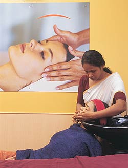 Beauty - customer gets oil therapy at Hindustan Lever’s newly-opened Ayush beauty parlour. As India’s best known FMCG company tries to kick-start growth again, such forays into services will have an important role to play. So far, Ayush is faring well. This parlour in Khar, Mumbai, gets about 1,000 customers every month. It posted operating break-even in just 90 days