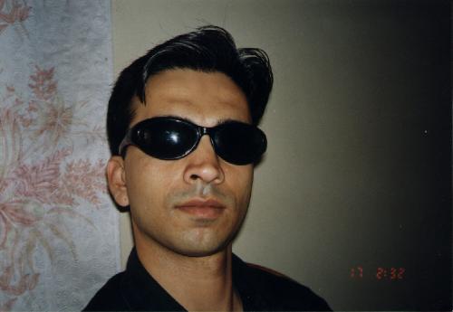 Simple yet Handsome..that's me. - This was the photo i got shot when i had just returned from Middle East.