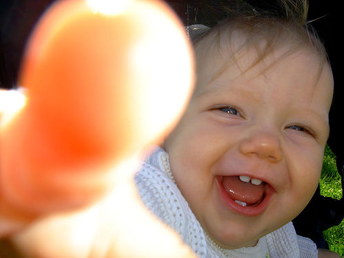 pinpointing - index finger of a cute baby pinpointing - index finger of a cute baby