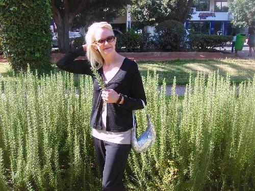Arletta - In the park on the way home from teaching at the British Center 2 in downtown Casablanca in front of bushes of Rosemary, they smell sooo incredible!!!