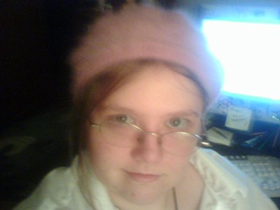 Fuzzy Pink Hat - This is me in one of my favorite hats, my fuzzy pink beret. I just love my expression in this photo.