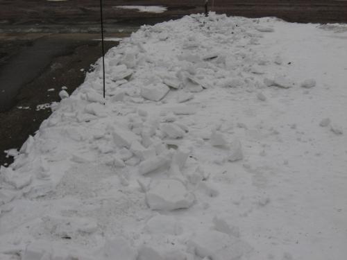 Yard Glaciers - The one side of my driveway full of snow chunks