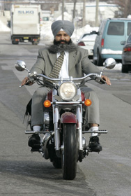 man wearing a turban - Man wearing a turban who doesn't want to wear a helmet.