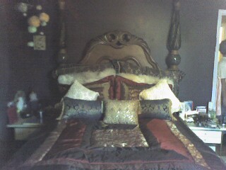My bed. - This is my crazy made bed. Lots of regal color. I wanted to create that 1800's old English Royal look. How'd i do?