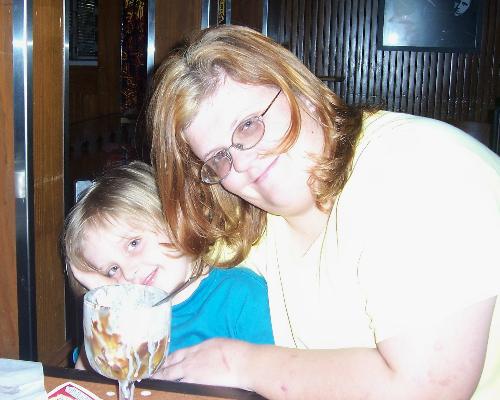 My son and I - for my birthday we went out - tht was my ice cream he and I finished! - I hate this pic but he loves being with his mommy!