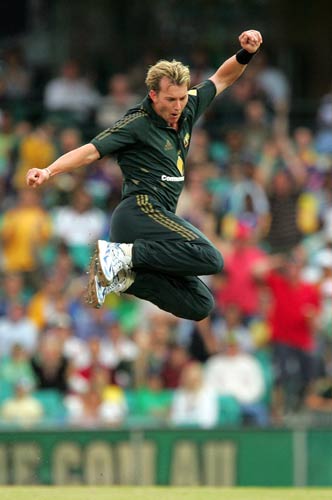 brett lee - brett lee jumps so high in the air after picking a wicket,that shows how determined he is when he bowls..