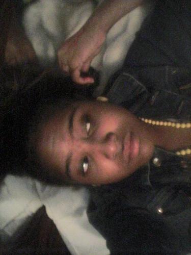 relaxing - really bored at home in my room, after just finishing homework.yay !